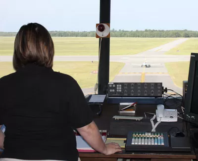 Female Student in Air Traffic Control Simulator
