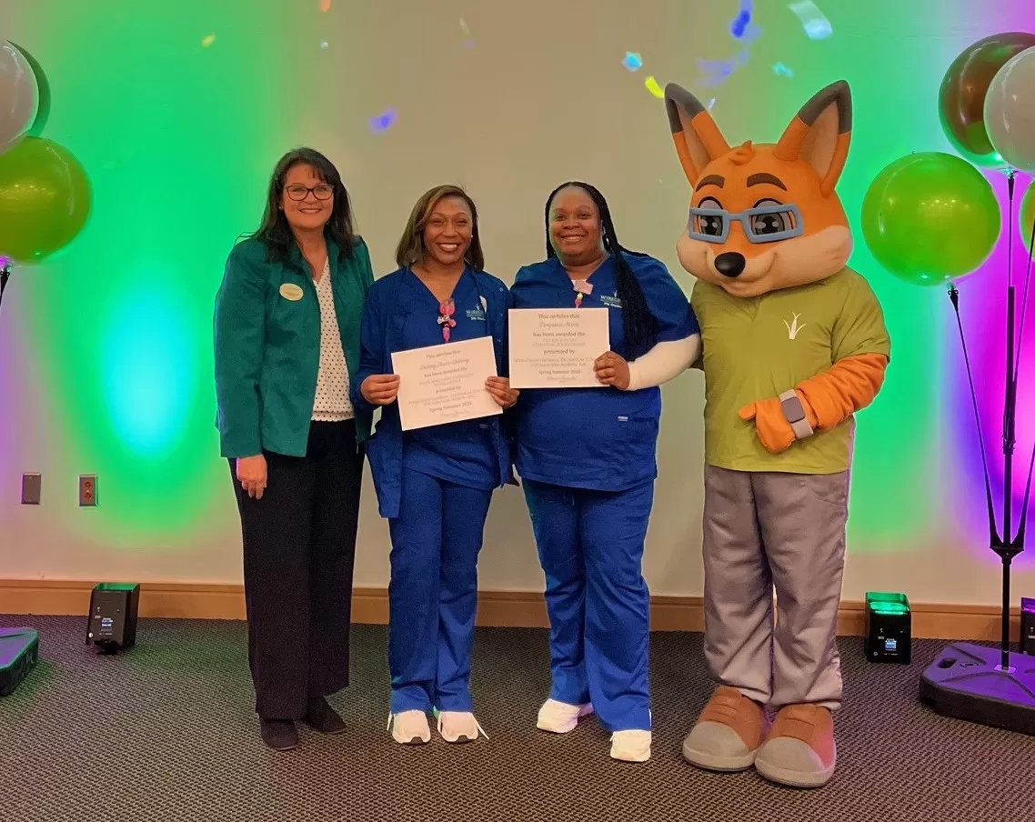 Pictured are Spring Semester scholarship recipients from the Ben Hill-Irwin Campus of Wiregrass Georgia Technical College. Left to right: Wiregrass President DeAnnia Clements, Destiny Davis-Deberry,  Tanjania Moss, and Max the Fox (Wiregrass mascot).
