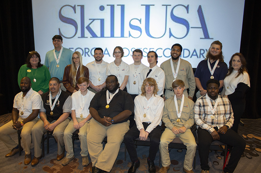 SkillsUSA Gold Winners, Kelley Wetherington, and President Clements